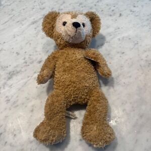 Preowned Disney Parks Duffy the Disney Bear plush with original tag attached